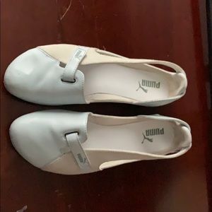 Gentle used puma slide ons.